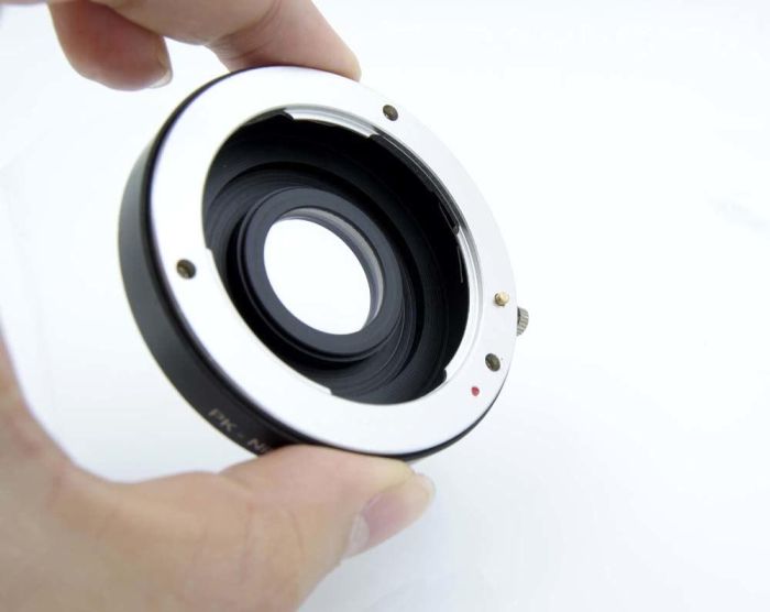 Адаптер (перехідник) Pentax PK - Nikon (PK-AI) з коригувальною лінзою